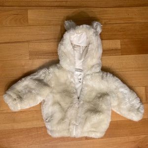 NWT Super cute faux fur zip hooded jacket w/soft velour lining. Polarbear ears.